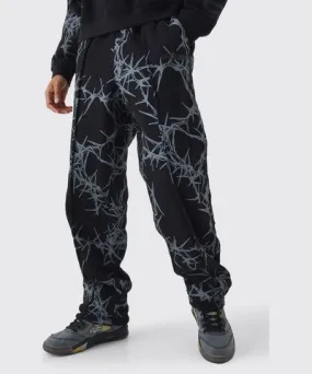 boohooMAN Mens Oversized Fit Tonal All Over Print Sweatpants