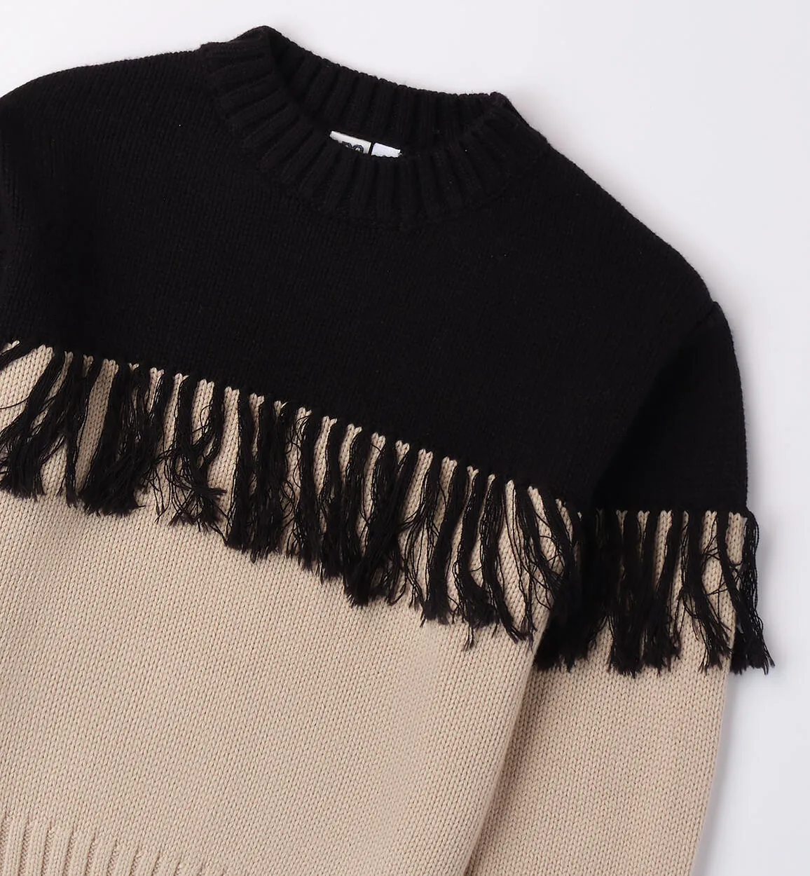 Fringed sweater girl