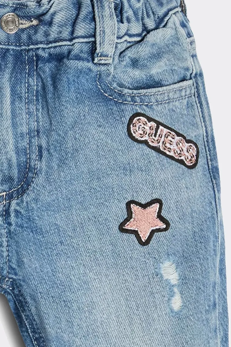 JEANS FASHION A GAMBA AMPIA CON PATCH